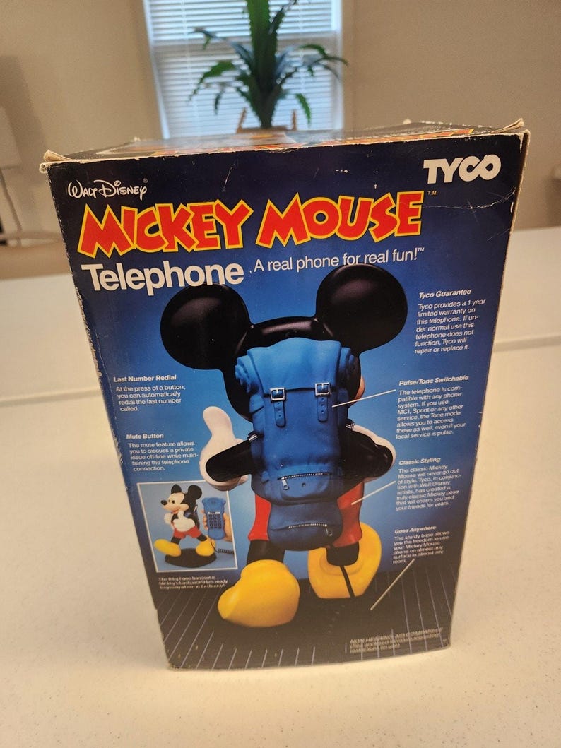 Teléfono de viaje vintage de Mickey Mouse Tyco de los años 80, con mochila, caja e instrucciones. imagen 12