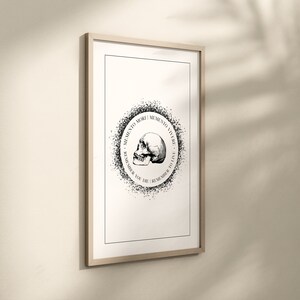 May include: Black and white print of a skull with the text "Memento Mori | Memento Vivere - To Remember You Die | Remember To Live" in a circle around it.