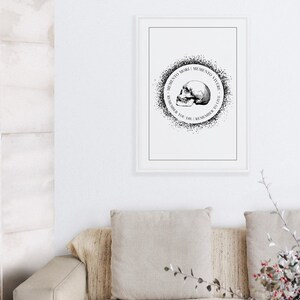May include: Black and white print of a skull with the text "Memento Mori | Memento Vivere | Remember You Die | Remember to Live" in a circle around it.