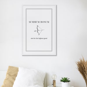 May include: A black and white print with the text "SUMMUM BONUM" and an illustration of an arrow and bow. The text below the illustration reads "aim for the highest good".