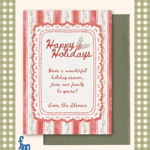 May include: A holiday greeting card with a red and white striped design, featuring the text "Happy Holidays." The card includes a decorative border and a green envelope. The message reads, "Have a wonderful holiday season, from our family to yours! Love, the Stevens."