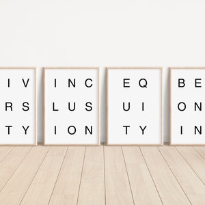 May include: Four framed prints with the words "DIVERSITY", "INCLUSION", "EQUITY", and "BELONGING" spelled out in black letters on a white background.