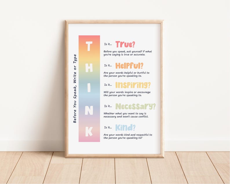 May include: A framed poster with the word "THINK" in colorful vertical blocks. The poster includes questions to consider before speaking, such as "Is it True?" and "Is it Kind?" The poster is displayed on a wooden floor.