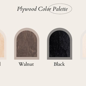 Plywood color palette featuring four wood finish options displayed in arched swatches labeled from left to right: Natural (light beige wood tone), Walnut (dark brown wood grain), Black (deep black wood texture), and White (light whitewashed wood). The title 'Plywood Color Palette' is written above the swatches