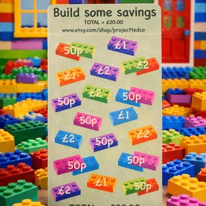 May include: A set of three ceramic mugs with a speckled, matte finish. The mugs are in shades of cream, light gray, and dark gray. Each mug has a simple, minimalist design and a rounded handle.