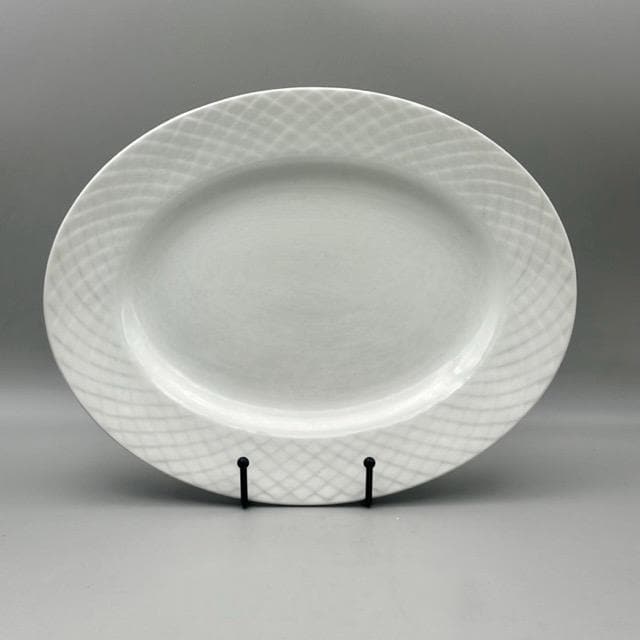 PLAT OVALE ANCIEN EN CÉRAMIQUE BLANCHE