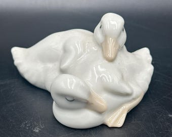 Nao Figurine Of Two Ducks Laying Together