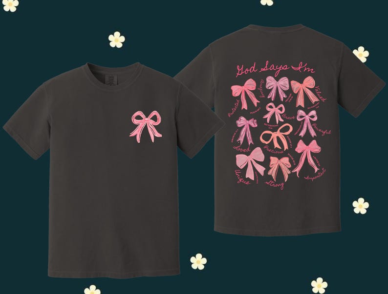 May include: Two black t-shirts with pink bows and the text "God says I'm" with a list of positive words. The words are: "valued, precious, loved, unique, strong, spirited, creative, gifted, beautiful, blessed, worthy".