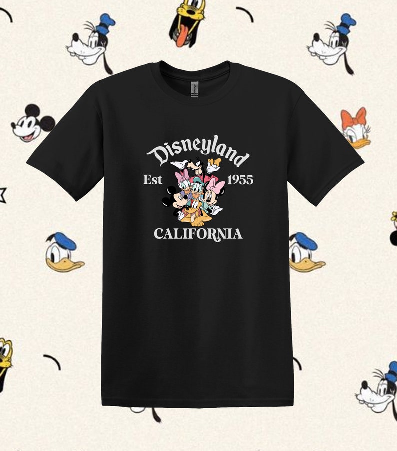 May include: Black t-shirt with a white graphic of Mickey Mouse, Minnie Mouse, Donald Duck, Goofy, and Pluto. The graphic says "Disneyland Est 1955 California".