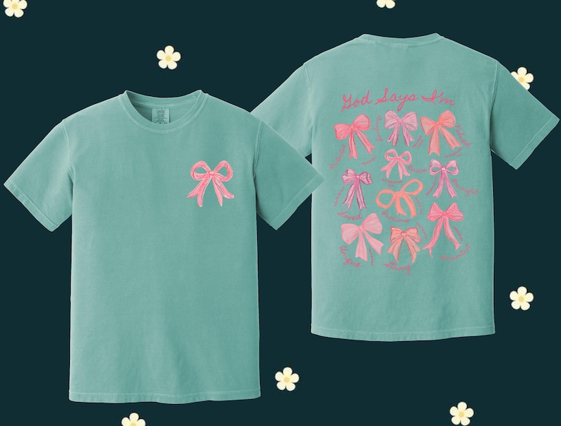 May include: Two teal blue t-shirts with pink bows embroidered on them. The front of one shirt has a single bow, while the back of the other shirt has multiple bows and the text "Good days are in".