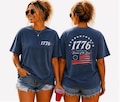 Comfort Colors® 1776 Shirt, Land of the Free, Front and Back Print, 1776 Patriotic Tee, Vintage 4th of July, Distressed USA Flag Shirt product logo