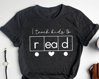 I Teach Kids to Read Tshirt, Reading Teacher Tshirt, Elementary Teacher Gift, Reading Specialist, Interventionist Shirt, Literacy Education