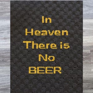 May include: Black and yellow sign with the text "In Heaven There Is No BEER".