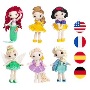May include: Seven crocheted dolls representing Disney princesses, each with a different hairstyle, dress, and color scheme. The dolls are arranged in two rows, with the top row featuring Ariel, Belle, and Snow White, and the bottom row featuring Tinkerbell, Rapunzel, and Elsa. The dolls are all standing on a white background.