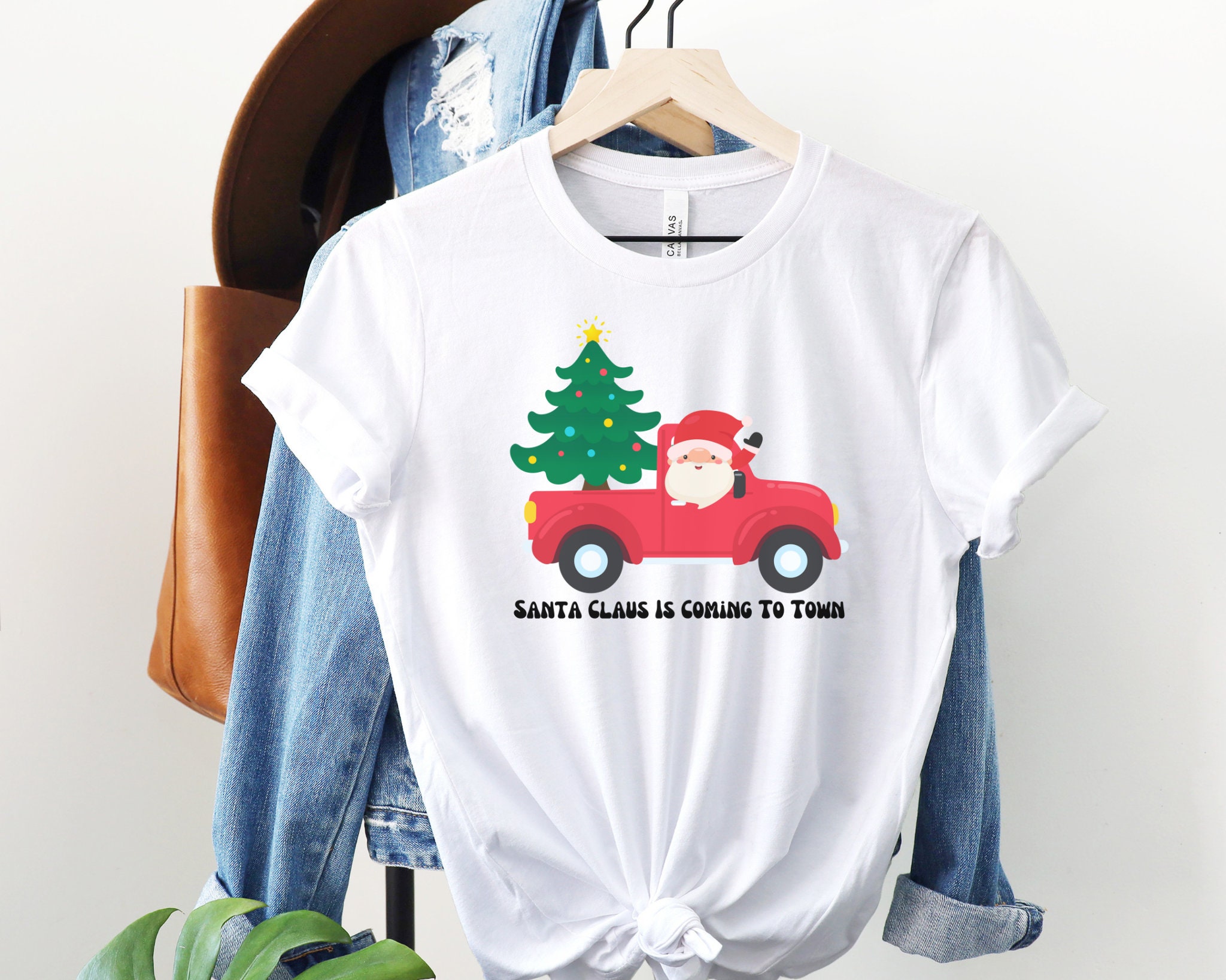 Discover Santa Claus Is Coming To Town Shirt, Santa Claus Is Coming, Secret Santa Shirt