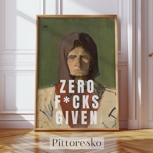 May include: Framed art print featuring a portrait of a person with a serious expression, wearing a head covering and a red sash. Bold white text reads "ZERO F*CKS GIVEN" on the artwork. The artist's name, "Pittoresko," is at the bottom.