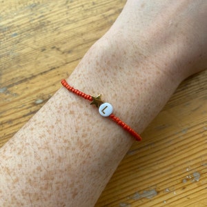 Custom made beaded star and initial bracelet