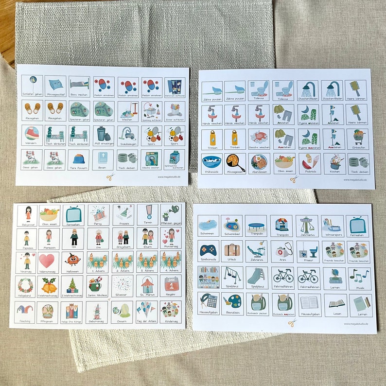 May include: Four white sheets of paper with colorful illustrations of various activities and objects. The illustrations are organized in a grid format with each square containing a different image. The images include activities like swimming, playing, eating, and sleeping, as well as objects like a toothbrush, a car, a book, and a phone. The sheets are labeled with German words.