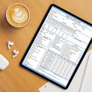 May include: A digital tablet displaying an OASIS-E2 cheat sheet form with sections for patient information, vitals, medical history, behaviour, mobility, and functional status, alongside a cup of coffee, white wireless earbuds, and a stylus.