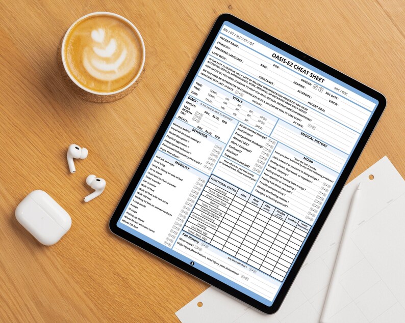 May include: A digital tablet displaying an OASIS-E2 cheat sheet form with sections for patient information, vitals, medical history, behaviour, mobility, and functional status, alongside a cup of coffee, white wireless earbuds, and a stylus.