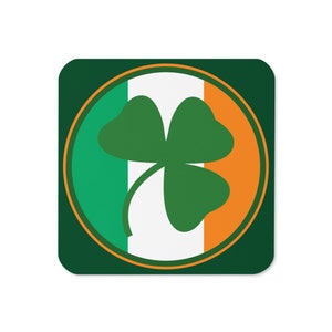 May include: A green shamrock with three leaves is centered in a circle with the Irish flag colors: green, white, and orange. The circle is on a green background.