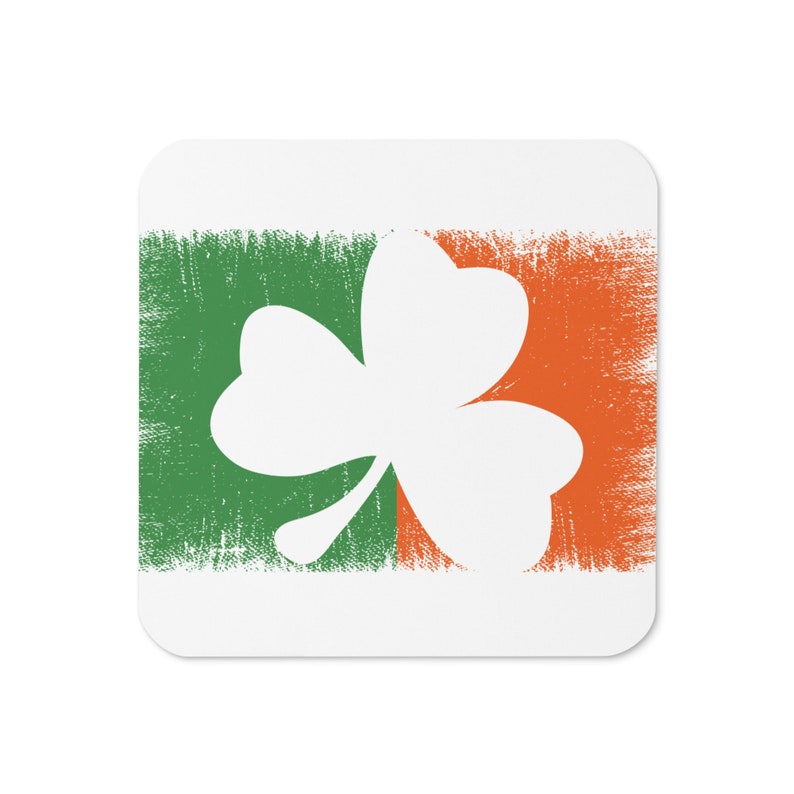 May include: A white shamrock silhouette on a green and orange background. The background has a distressed, textured look.
