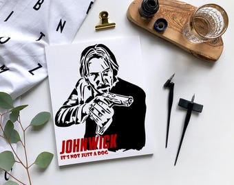 May include: Black and white illustration of John Wick holding a gun. The text "John Wick" and "It's not just a dog" is in red.