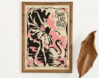 May include: A framed poster featuring a black and pink illustration of a ballet dancer and a swan. The text reads SWAN LAKE BALLET, NYC, SUMMER 1996, DANCE, MUSIC, POETRY. The design is enclosed in a decorative border within a wooden frame.