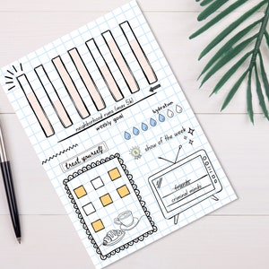 Puede incluir: Una ilustración en blanco y negro de un planificador semanal con un fondo cuadriculado. El planificador incluye una barra de progreso para las carreras de vecindario, un rastreador de hidratación, una sección de "date un capricho" con una cuadrícula de cuadrados y una pantalla de televisión con el texto "amigos" y "mentes criminales".