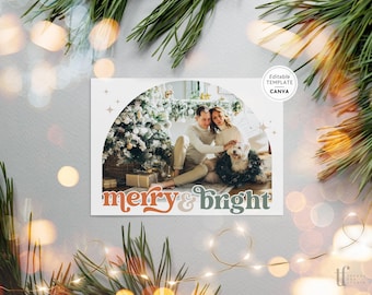 May include: A rectangular holiday card template featuring an arched photo of two people and a dog near a Christmas tree. The text merry & bright is printed in a retro font at the bottom. A circular badge in the corner reads Editable Template Canva.