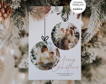 May include: A rectangular Christmas card template featuring two circular photo frames hanging from illustrated strings. The card displays the text Merry Christmas and WITH LOVE FROM THE MILLER FAMILY. A circular badge reads Editable Template Canva.