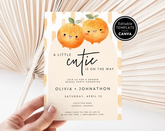 May include: A gender reveal party invitation with orange illustrations. The invitation features two cartoon oranges with smiling faces and the text "A Little Cutie Is On The Way." The invitation includes details for the party, such as the date, time, and location.