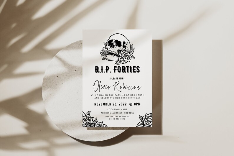 May include: A cream-colored invitation card with black text and illustrations. The card features a skull with roses, the text "R.I.P. FORTIES", and event details. The invitation is for Olivia Robinson's 50th birthday on November 25, 2022.
