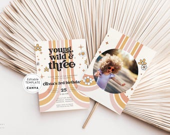 May include: Two rectangular birthday invitation cards featuring a rainbow design in muted pink, orange, and cream tones. The text reads Young, Wild & Three, Olivia's 3rd birthday, and includes a circular photo frame with a child wearing heart sunglasses.