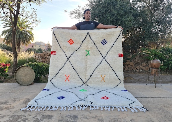 Handmade Moroccan Azilal Rug: White Wool Berber Carpet with Colorful Geometric Motifs