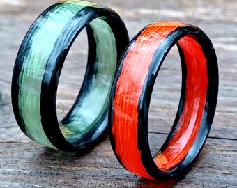 Anillos luminosos de fibra de carbono de color rojo fuego o verde