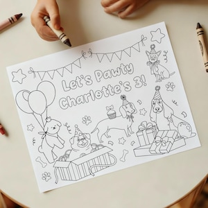 Puede incluir: Página para colorear en blanco y negro con el texto "Let's Pawty Charlotte's 3!" con ilustraciones de perros, globos, regalos y gorros de fiesta. La mano de un niño sostiene un crayón.