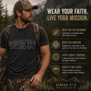 May include: A dark gray t-shirt with the text "GENESIS 27:3 HUNT GAME FOR ME" is worn by a person wearing a camouflage cap and backpack. The image includes text that says "WEAR YOUR FAITH. LIVE YOUR MISSION."
