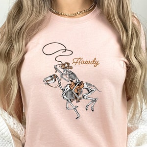 Howdy Rodeo Skeleton Cowboy Tshirt, Western Halloween Rodeo Shirt, Western Halloween Tee, Unisex Shirt Gift for Cowboy, Cowgirl, Horse Lover