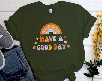 Camiseta "Que tengas un buen día", flores arcoíris retro, vibras positivas