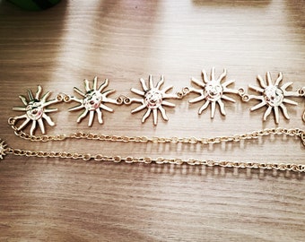 Metal chain belt with a simple sun Witch