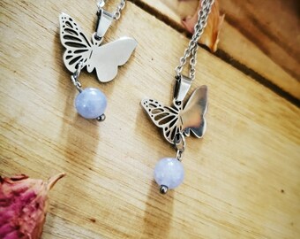 Collier papillon avec perle d'aquamarine. Spiritualité et joie.