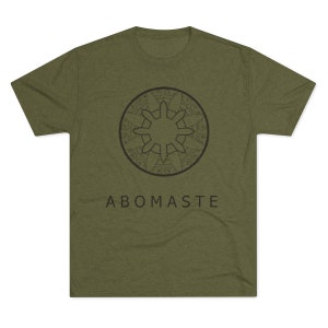 May include: A green t-shirt with a black mandala design and the text "ABOMASTE" printed on the front.