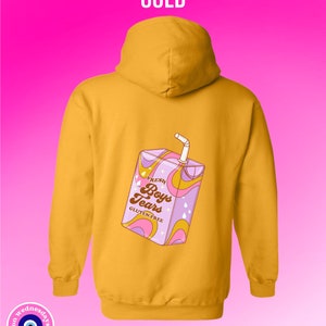 May include: A gold hoodie with a cartoon illustration of a juice box with the text "Fresh Boys Tears Gluten-Free" on the back.