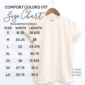 Puede incluir: Tabla de tallas para camisetas en marfil, que muestra las medidas en pulgadas para las tallas S a 4X. La tabla muestra las medidas de ancho y largo para cada talla.