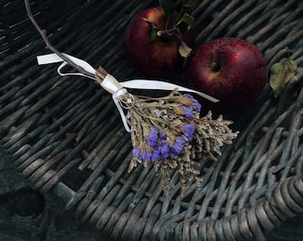 Mini Altar Cinnamon Broom with dried flowers, Moon and Star Charm and white ribbon.