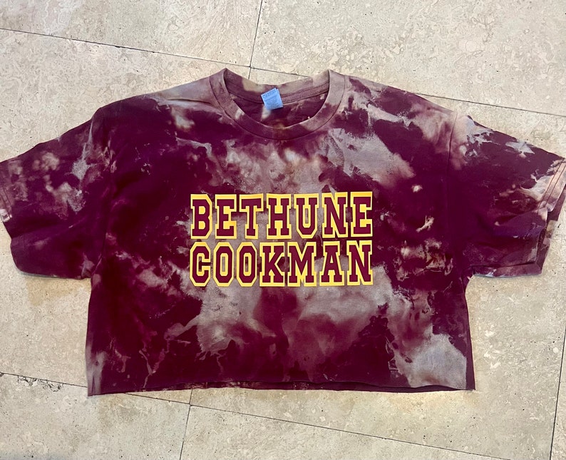BETHUNE COOKMAN garnet bleach crop tee with gold and  maroon letters.