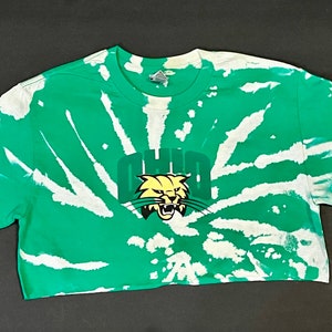 Ohio University in a green bleach tie dye crop tee with logo
