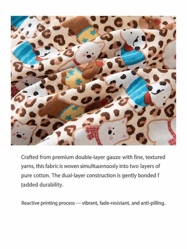May include: Close-up of a beige fabric with a repeating pattern of cartoon bears and leopard spots. The bears wear blue and brown outfits. The fabric is made of double-layer gauze.