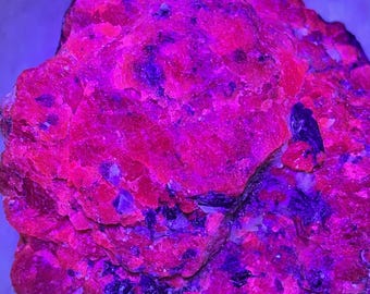 Bright Pink UV Raw Ruby Corundum…See video!